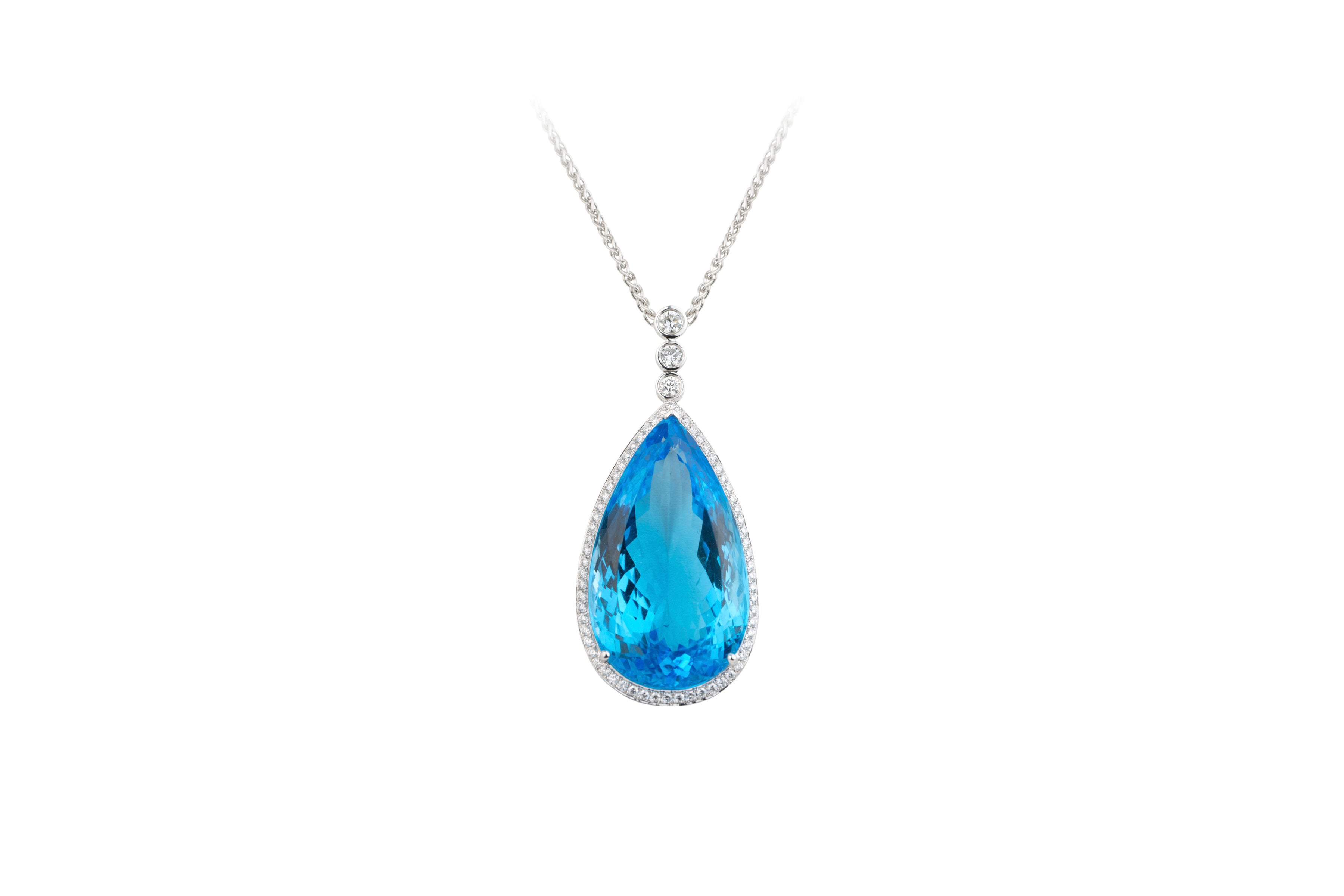 SB13904 Blue Topaz Pear Cut & Brilliant Cut Diamond Pendant & Chain in 18ct White Gold