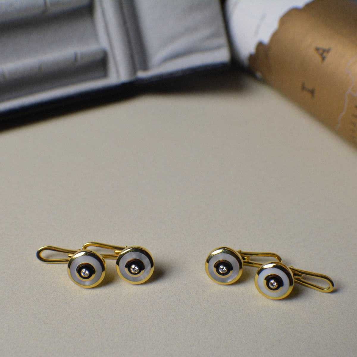 Hallmarked 18ct Yellow Gold Studs set with Mother-of-Pearl and Diamond
