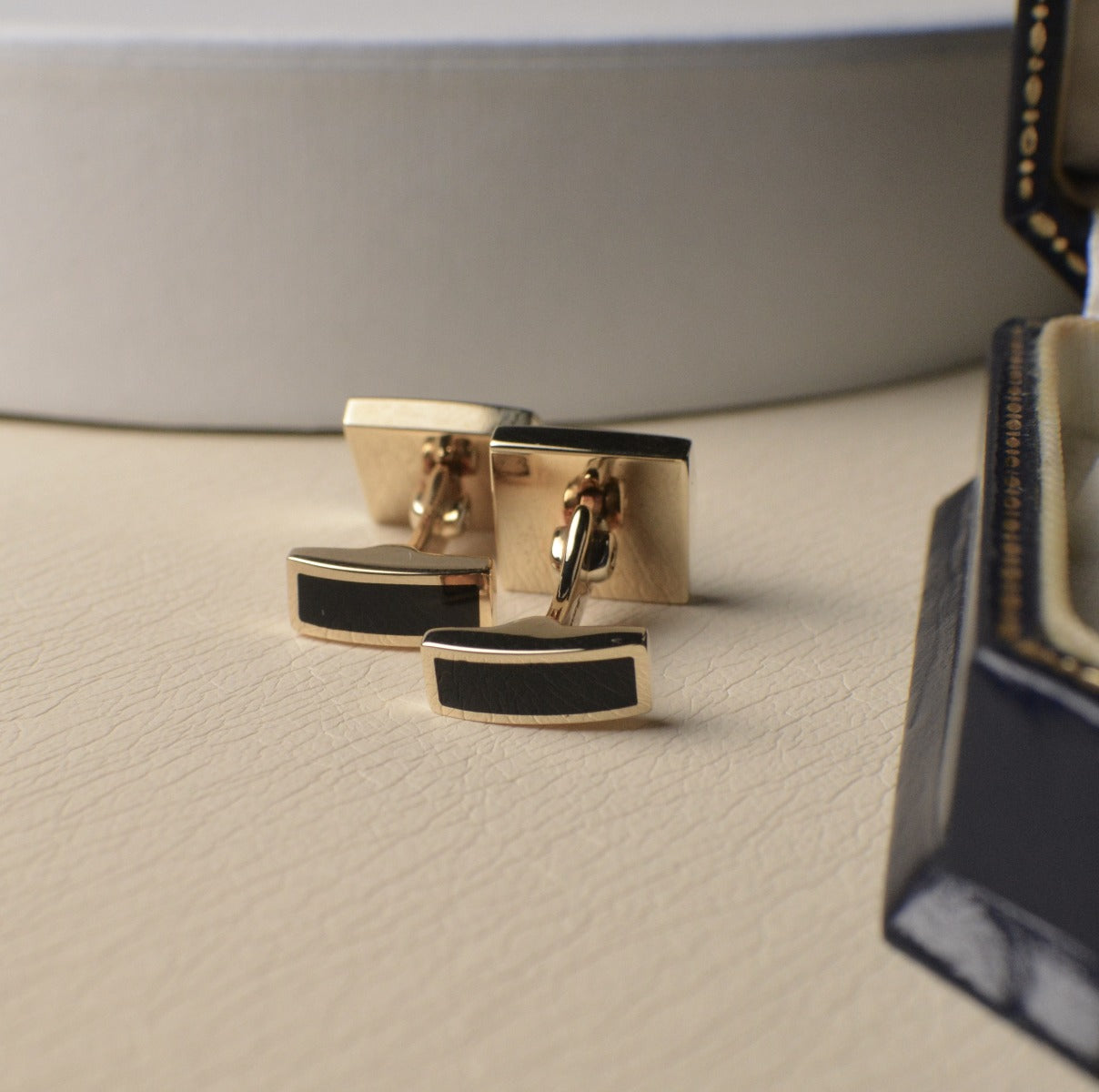 9ct Yellow Gold Cufflinks set with cut Onyx