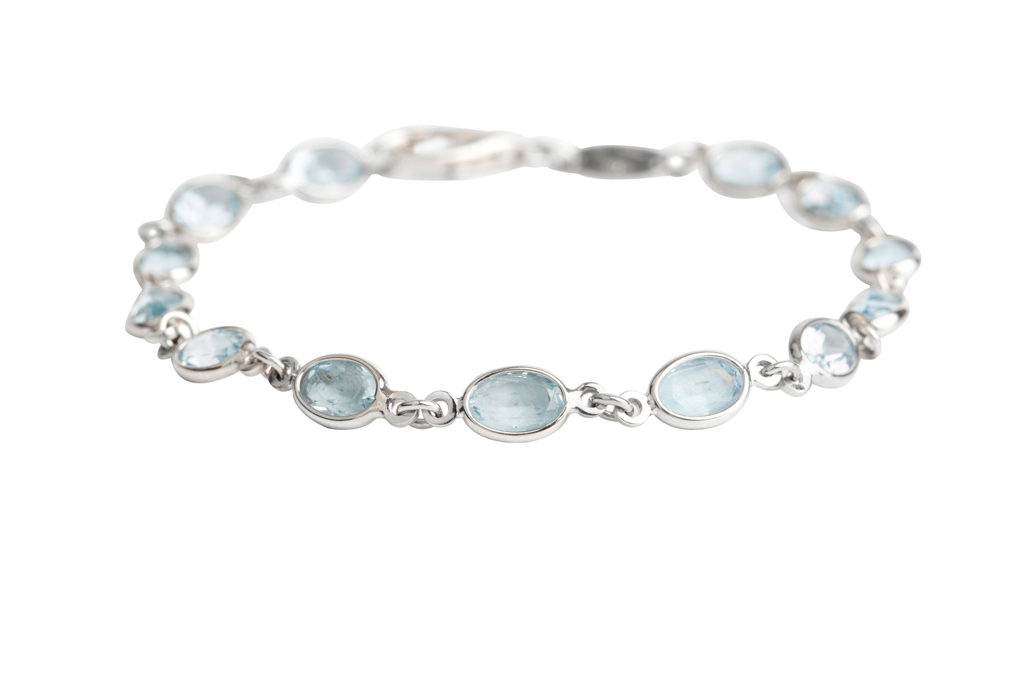 OP9705 Blue Topaz Line Bracelet in 18ct White Gold