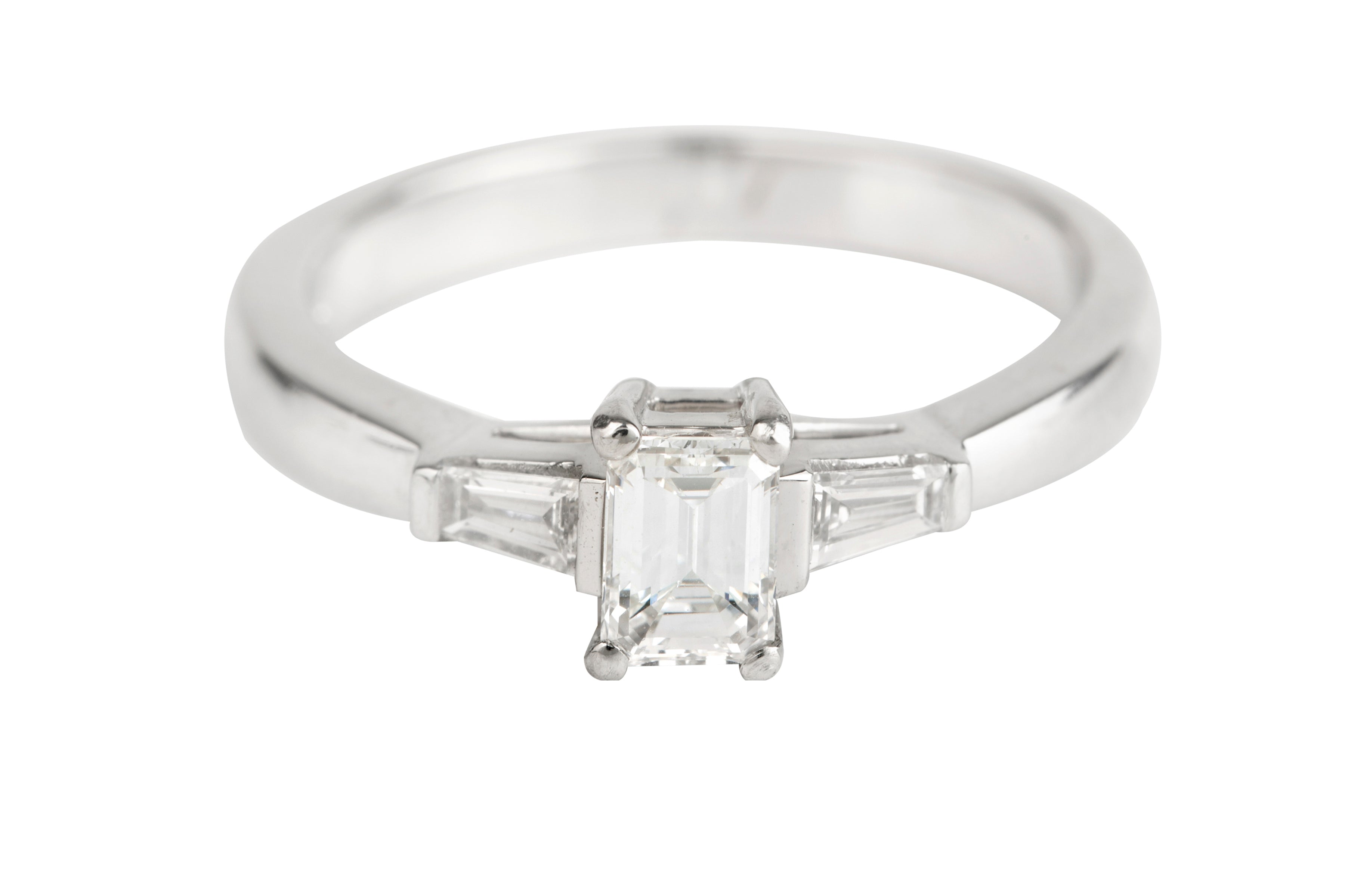 SN4511 Emerald & Tapered Bagutte Cut Diamond Three Stone Ring in Platinum (0.62ct)